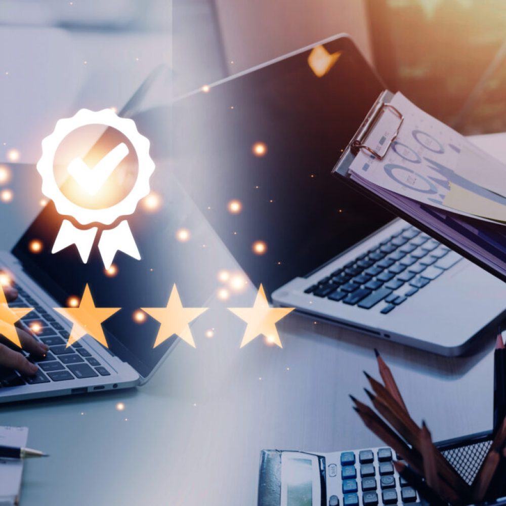 Hand shows the sign of the top service Quality assurance 5 star, Guarantee, Standards, ISO certification and standardization concept.